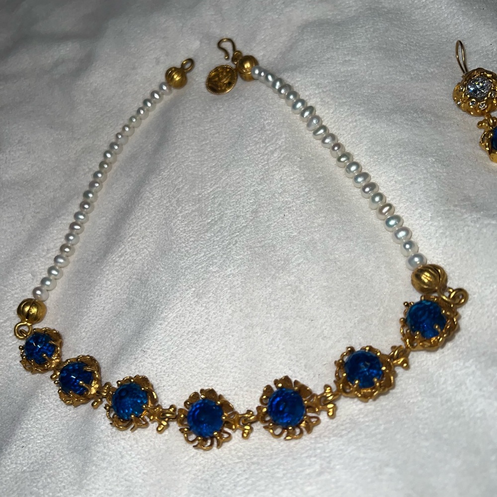 Purchased at a boutique on Anna Maria Island FL, not sure of brand.  Very classy